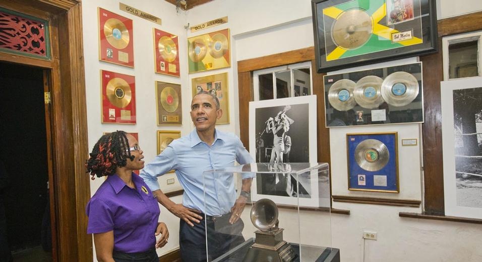 U.S. President Barack Obama visits the Bob Marley Museum with tour guide Natasha Clark, Wednesday, April 8, 2015 in Kingston, Jamaica. (AP Photo/Pablo Martinez Monsivais)
